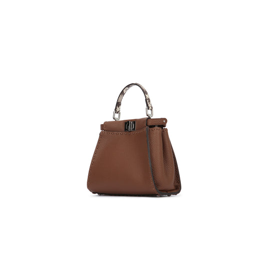 Mala Peekaboo em Pele
